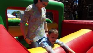 Ivan and mom in the bouncy house