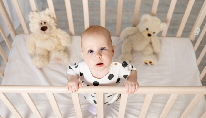 baby escapes crib under mattress