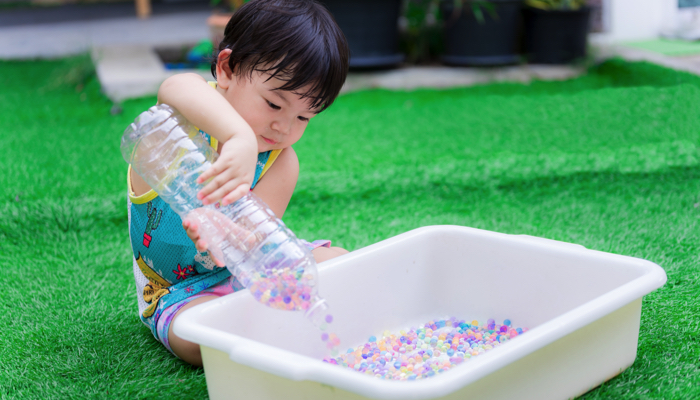 Introducing New Play Materials to Kids: Experimenting and Observing Water  Beads - Happily Ever Mom