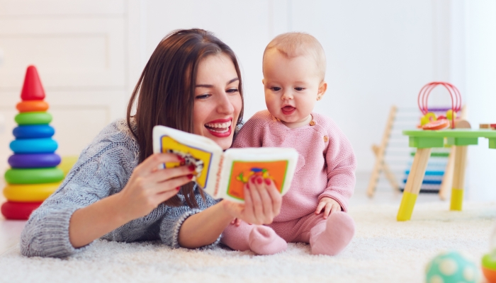 https://www.wonderbaby.org/wp-content/uploads/2023/02/Cute-mother-and-daughter-playing-together-reading-first-book.jpg