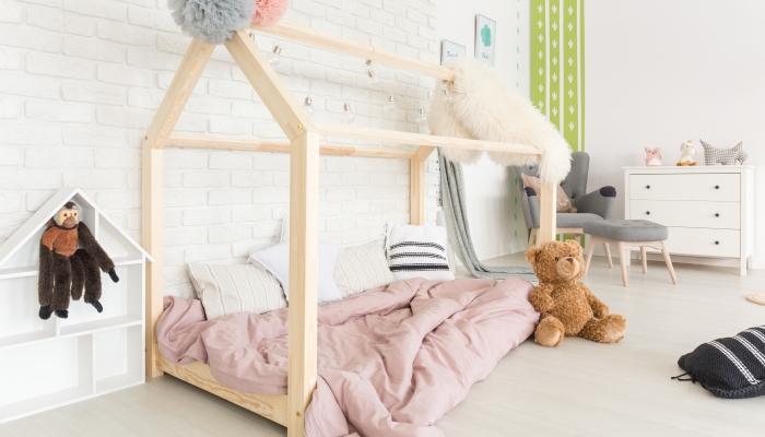 White child bedroom in scandinavian style with diy house bed.