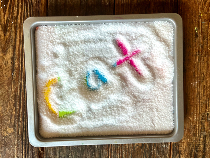 Color Surprise Salt Tray for Handwriting Practice writing C-A-T
