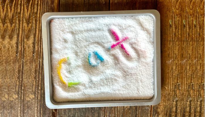 Color Surprise Salt Tray for Handwriting Practice writing C-A-T